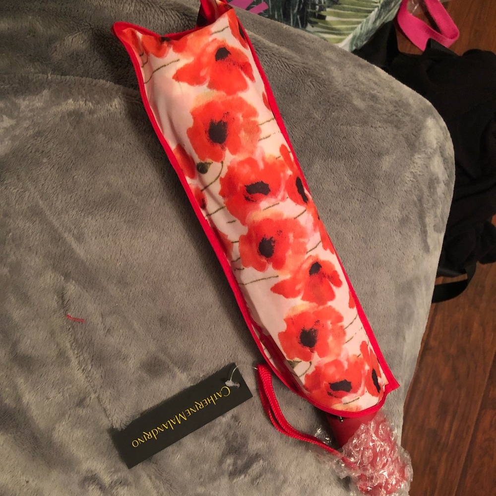 Catherine Amal’s drink floral umbrella